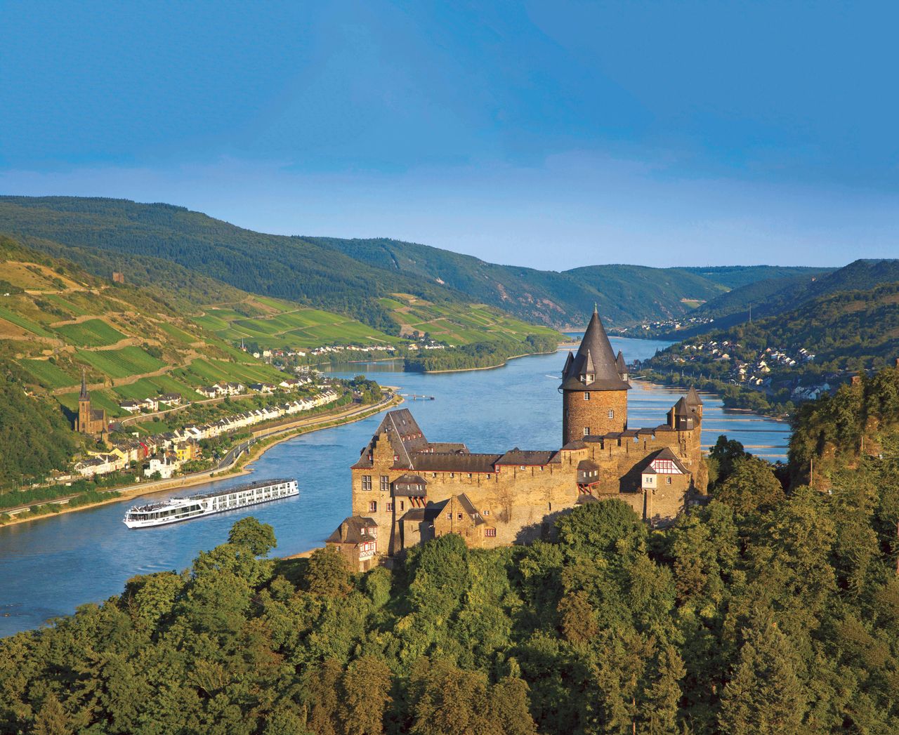 e_so3npQ Best luxury river cruise Europe docking in a historic town center.